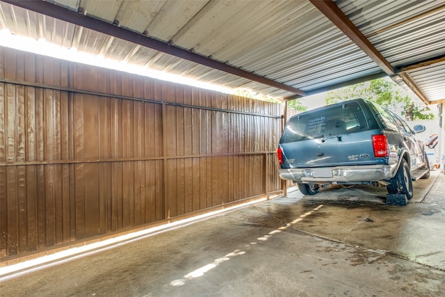 garage with a carport