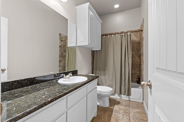 bathroom featuring toilet, tile patterned floors, shower / bath combination with curtain, and vanity