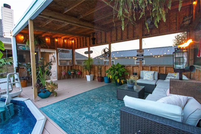 view of patio with outdoor lounge area and a deck