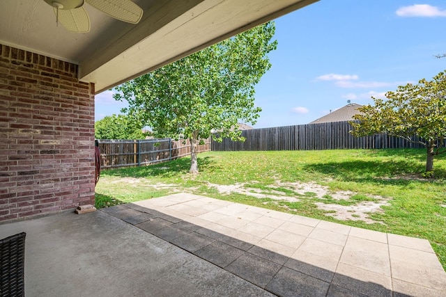 view of patio featuring ceiling fan