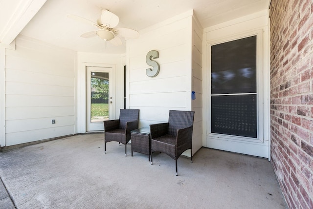 view of patio featuring ceiling fan