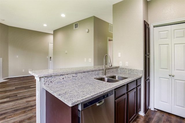 kitchen with light stone countertops, dishwasher, sink, dark hardwood / wood-style flooring, and kitchen peninsula