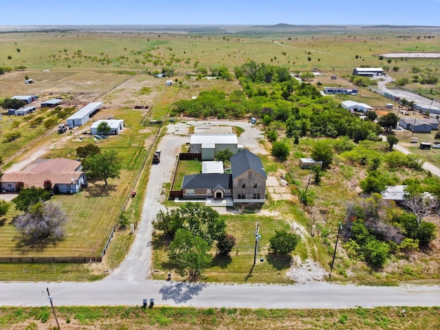 birds eye view of property featuring a rural view