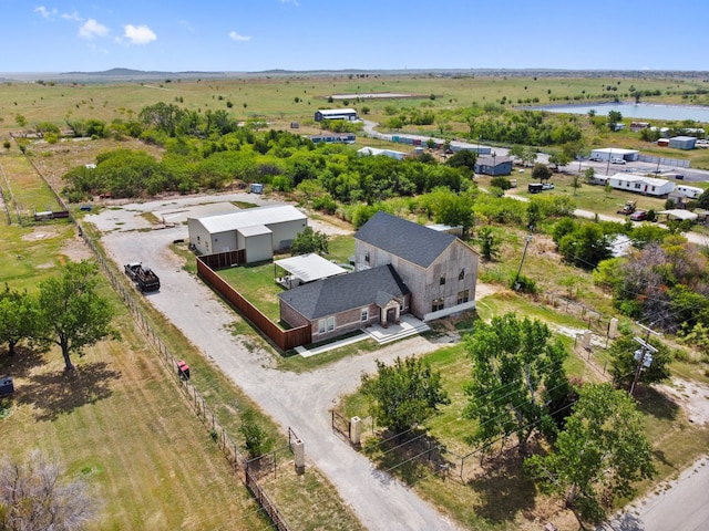 bird's eye view with a water view and a rural view