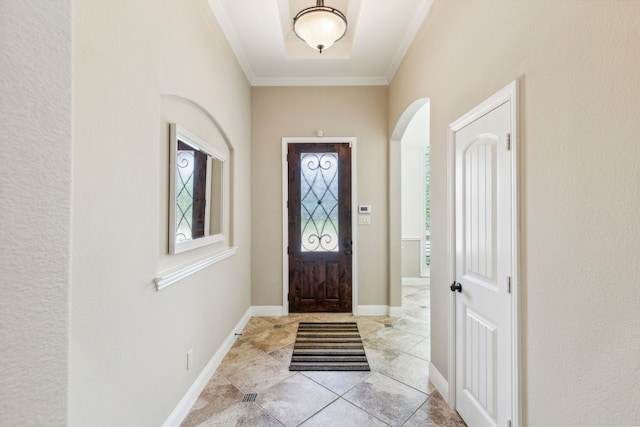 tiled entryway with crown molding