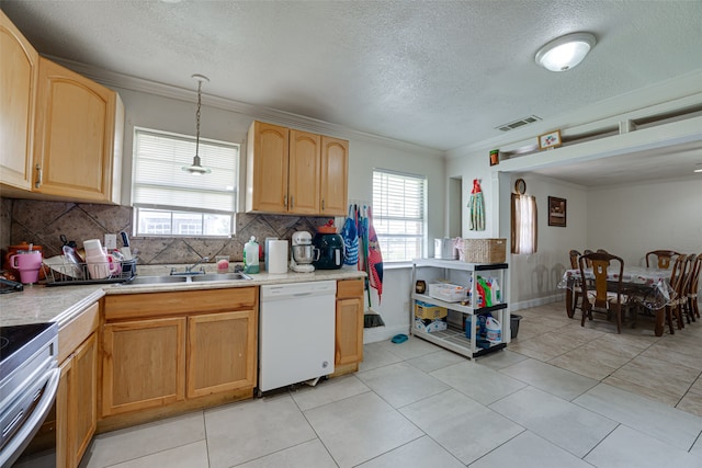 kitchen with crown molding, dishwasher, a textured ceiling, light tile patterned floors, and backsplash