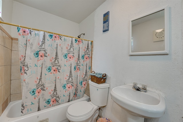 full bathroom featuring sink, toilet, and shower / bath combination with curtain