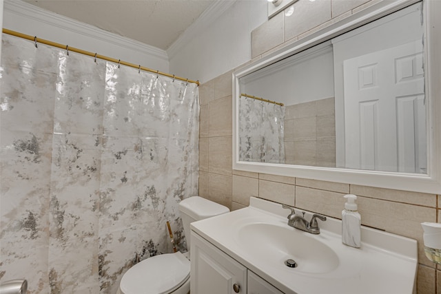 bathroom with vanity, toilet, crown molding, and tile walls