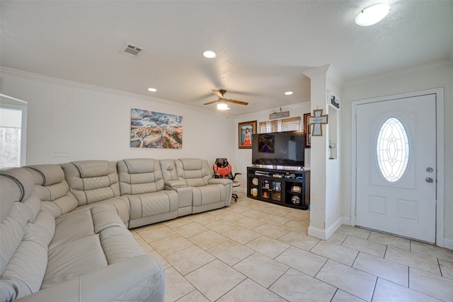 living room featuring light tile patterned flooring, crown molding, and ceiling fan