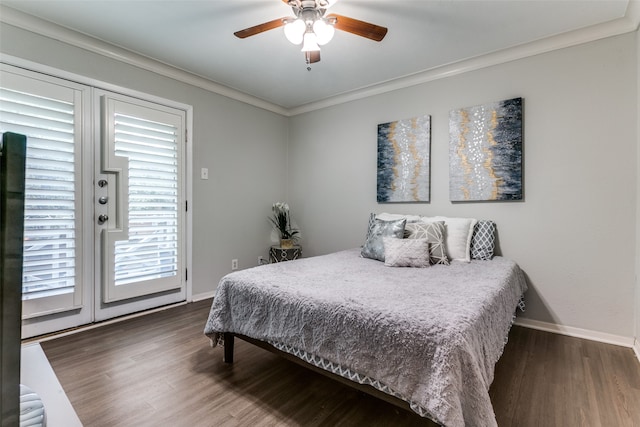 bedroom featuring access to outside, dark hardwood / wood-style flooring, ornamental molding, and ceiling fan