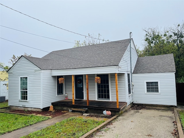 view of front of house featuring central air condition unit and a porch