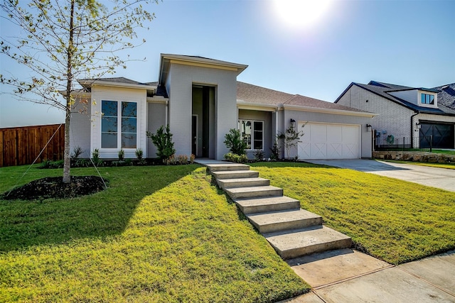 view of front facade with a front lawn and a garage