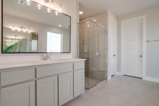 bathroom with vanity, tile patterned floors, and an enclosed shower