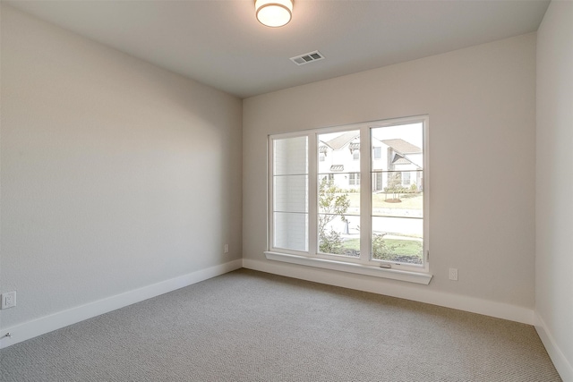 empty room with carpet floors