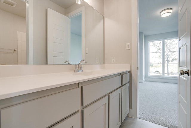 bathroom featuring vanity and tile patterned floors