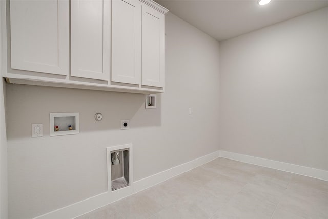 laundry room with hookup for a gas dryer, washer hookup, cabinets, and electric dryer hookup