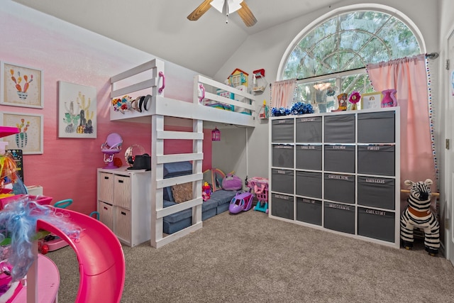 carpeted bedroom featuring ceiling fan and vaulted ceiling