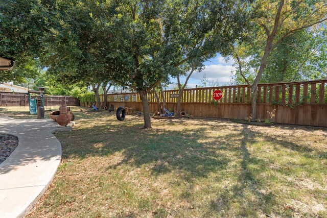 view of yard with a playground