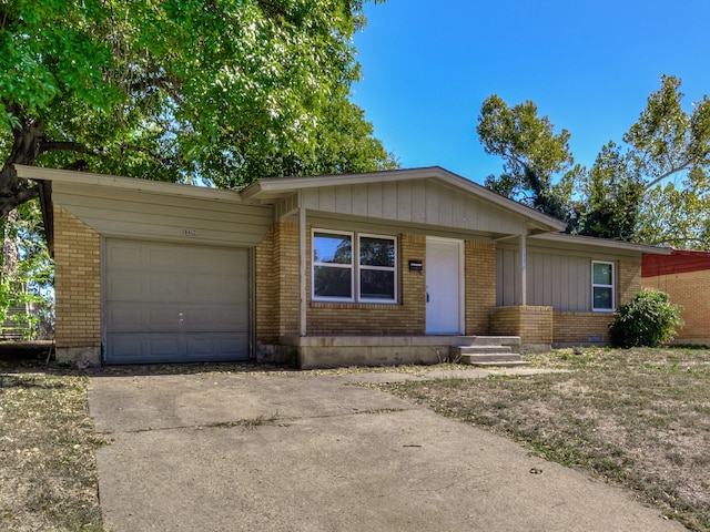 single story home with a garage