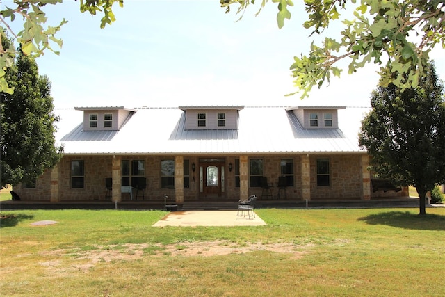 rear view of house with a lawn