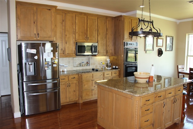 kitchen with tasteful backsplash, light stone counters, black appliances, dark hardwood / wood-style flooring, and a center island