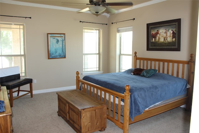 bedroom with carpet floors, ceiling fan, and ornamental molding