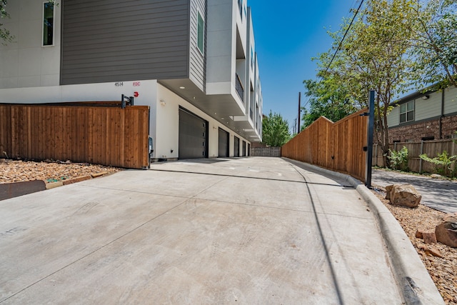 view of property exterior with a garage