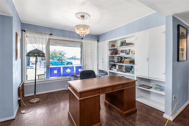 home office featuring built in features, dark hardwood / wood-style floors, and an inviting chandelier