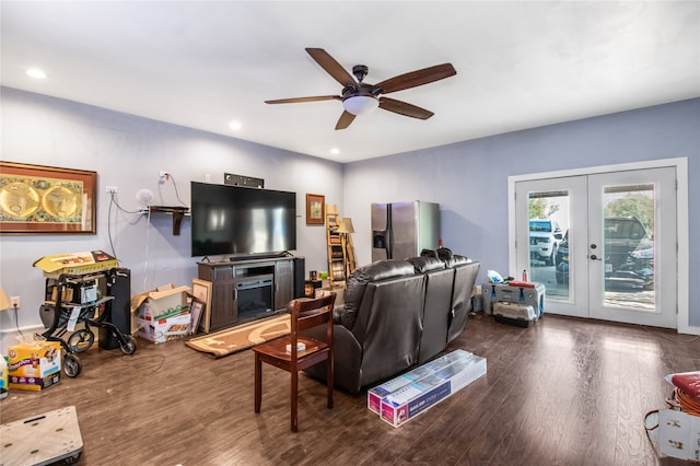 living room featuring ceiling fan, french doors, and hardwood / wood-style flooring