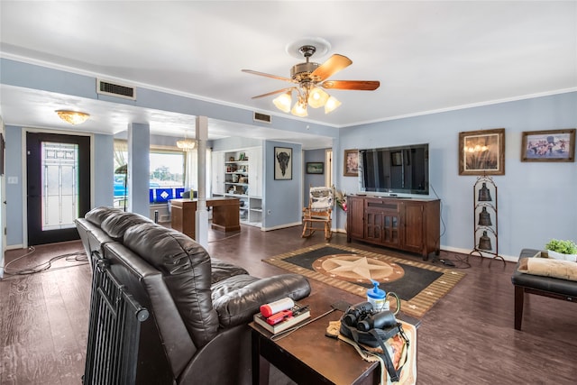 living room with crown molding, hardwood / wood-style floors, and ceiling fan