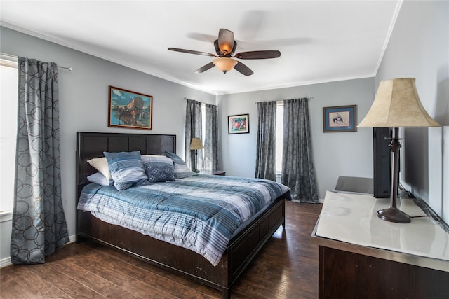 bedroom with ceiling fan, crown molding, and dark hardwood / wood-style flooring