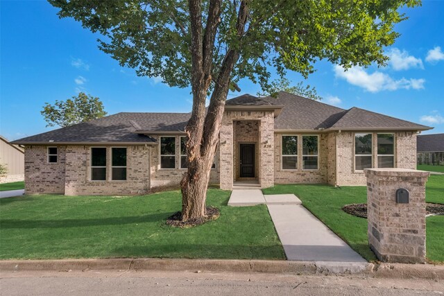 view of front of house with a front lawn