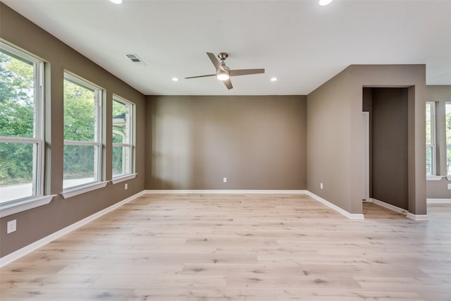 unfurnished room with light hardwood / wood-style floors and ceiling fan