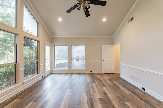 kitchen with white cabinetry, an inviting chandelier, dark hardwood / wood-style floors, stainless steel appliances, and ornamental molding