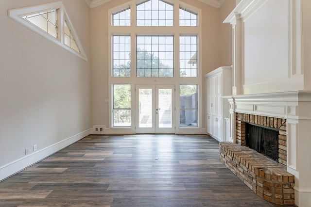 spare room featuring ornamental molding, high vaulted ceiling, ceiling fan, and dark hardwood / wood-style floors