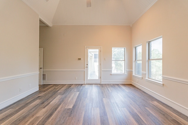 unfurnished dining area featuring wood-type flooring, a chandelier, and plenty of natural light