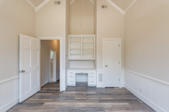 spacious closet featuring dark hardwood / wood-style floors