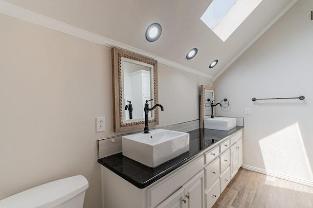 unfurnished room featuring wood-type flooring, ornamental molding, and ceiling fan