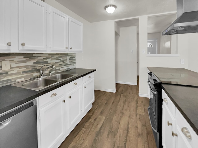 kitchen featuring white cabinetry, wall chimney range hood, stainless steel dishwasher, electric range oven, and hardwood / wood-style floors