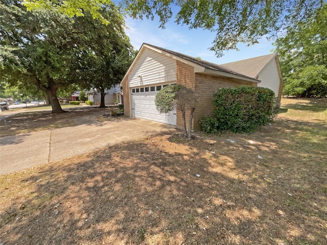 view of side of property featuring a garage