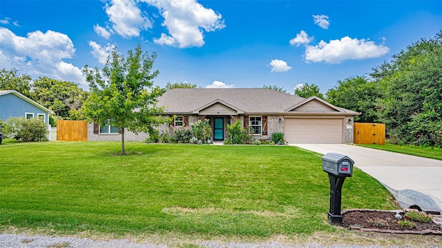 ranch-style house featuring a garage and a front yard