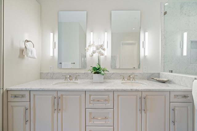 bathroom with vanity and walk in shower