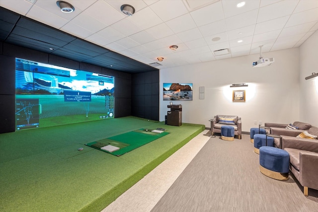 playroom featuring golf simulator, a paneled ceiling, and carpet