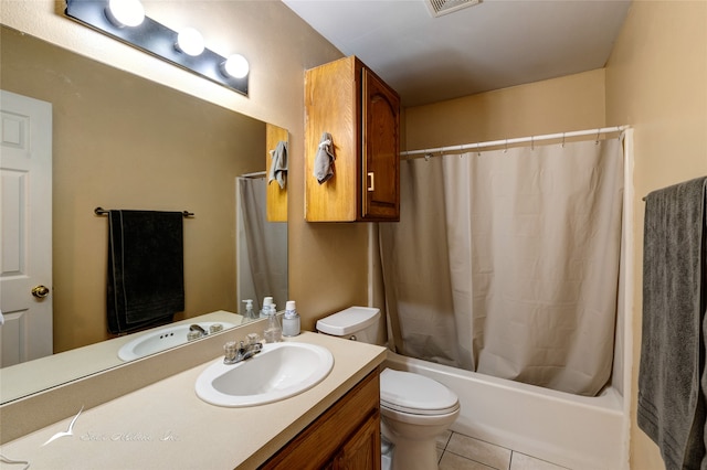 full bathroom featuring vanity, shower / bath combo, tile patterned flooring, and toilet