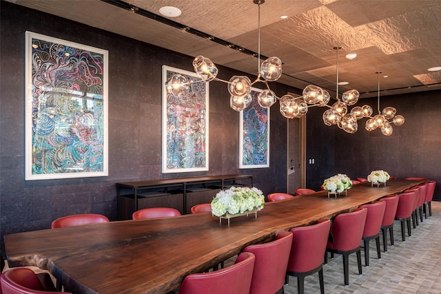 dining room with a notable chandelier