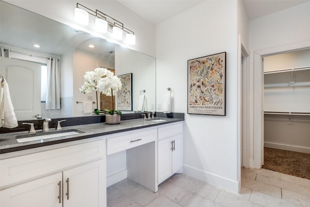 bathroom featuring vanity