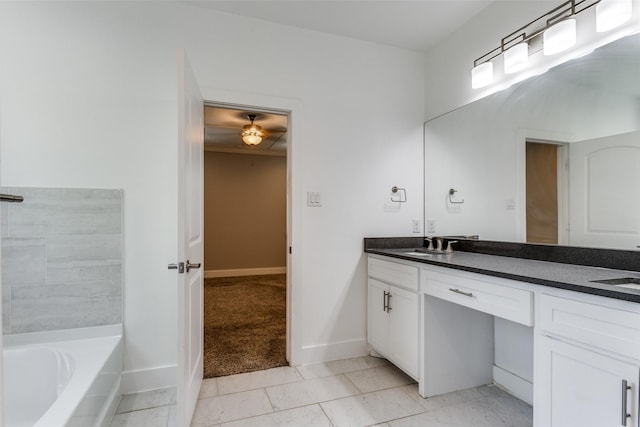 bathroom featuring vanity and a bathtub