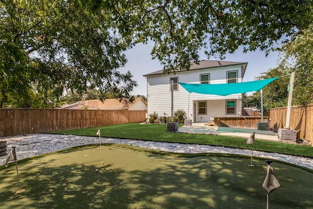 back of house with a patio area