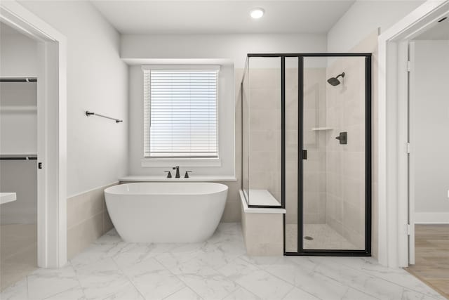 bathroom with independent shower and bath