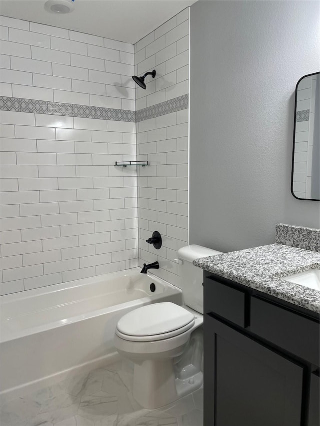 full bathroom featuring  shower combination, marble finish floor, vanity, and toilet